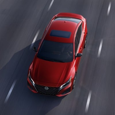 2024 Nissan Altima on highway illustrating dynamic driving tech